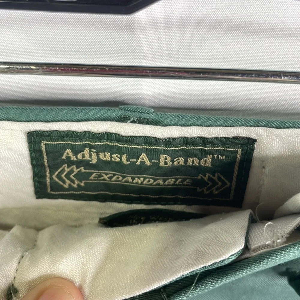 Adjust a band green flat front shorts